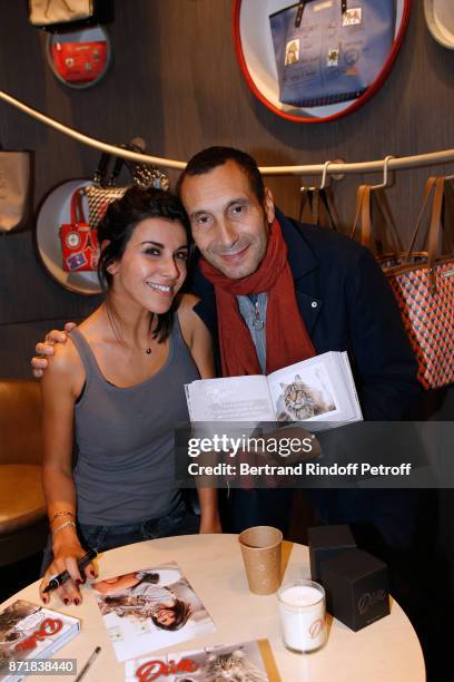 Reem Kherici and Zinedine Soualem attend Reem Kherici signs her book "Diva" at the Barbara Rihl Boutique on November 8, 2017 in Paris, France.