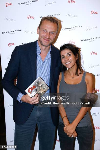 Nicolas Altmayer and Reem Kherici attend Reem Kherici signs her book "Diva" at the Barbara Rihl Boutique on November 8, 2017 in Paris, France.