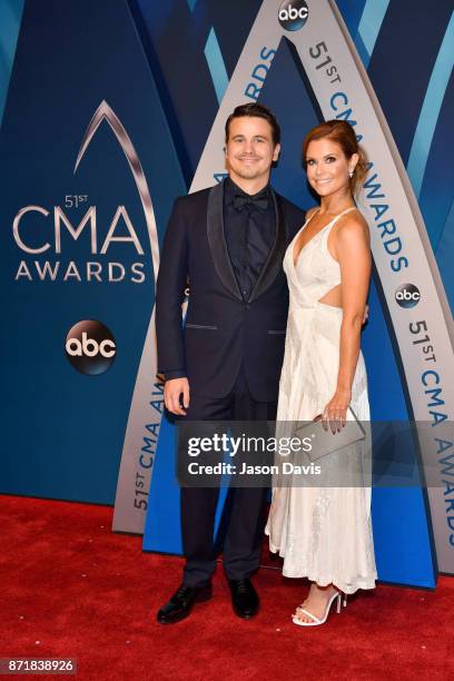 Actors Jason Ritter and JoAnna Garcia Swisher attend the 51st annual CMA Awards at the Bridgestone Arena on November 8, 2017 in Nashville, Tennessee.