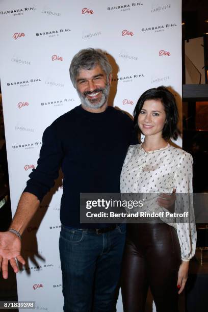 Francois Vincentelli and his companion Alice Dufour attend Reem Kherici signs her book "Diva" at the Barbara Rihl Boutique on November 8, 2017 in...