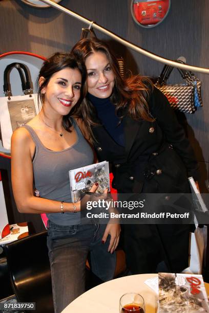 Reem Kherici and Nadia Fares attend Reem Kherici signs her book "Diva" at the Barbara Rihl Boutique on November 8, 2017 in Paris, France.