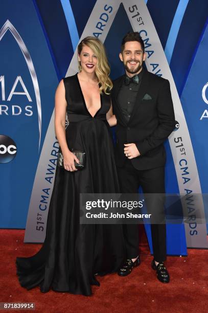 Lauren Akins and singer-songwriter Thomas Rhett attends the 51st annual CMA Awards at the Bridgestone Arena on November 8, 2017 in Nashville,...