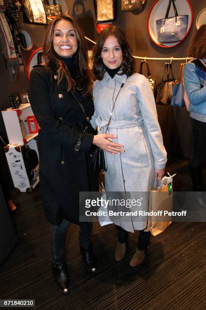 Nadia Fares and Melanie Bernier attend Reem Kherici signs her book "Diva" at the Barbara Rihl Boutique on November 8, 2017 in Paris, France.