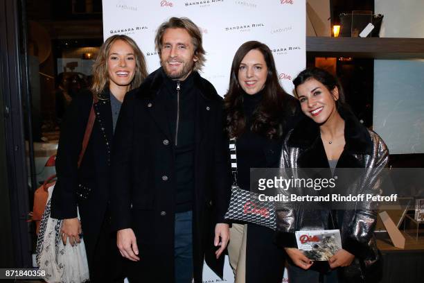 Elodie Fontan, Philippe Lacheau, Barbara Rihl and Reem Kherici attend Reem Kherici signs her book "Diva" at the Barbara Rihl Boutique on November 8,...