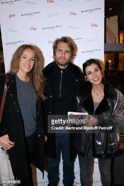 Elodie Fontan, Philippe Lacheau and Reem Kherici attend Reem Kherici signs her book "Diva" at the Barbara Rihl Boutique on November 8, 2017 in Paris,...