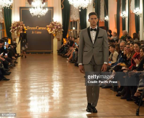 At the Grand Hotel Excelsior in Naples, the Neapolitan Designer Bruno Caruso presents his "Je t' aime" collections of evening dress.