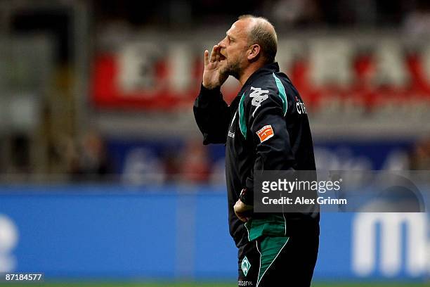 Head coach Thomas Schaaf of Bremen shouts from the sideline during the Bundesliga match between Eintracht Frankfurt and Werder Bremen at the...