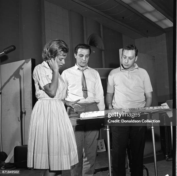 Musician Barry Mann records for JDS Records with Carole King and Alan Lorber on July 18, 1959 in New York.