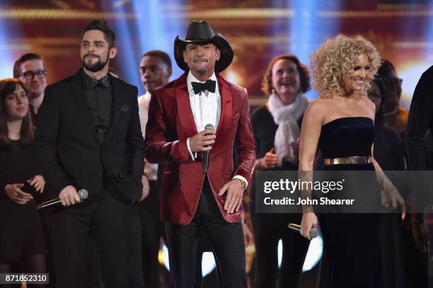 Thomas Rhett, Tim McGraw, and Kimberly Schlapman perform onstage at the 51st annual CMA Awards at the Bridgestone Arena on November 8, 2017 in...
