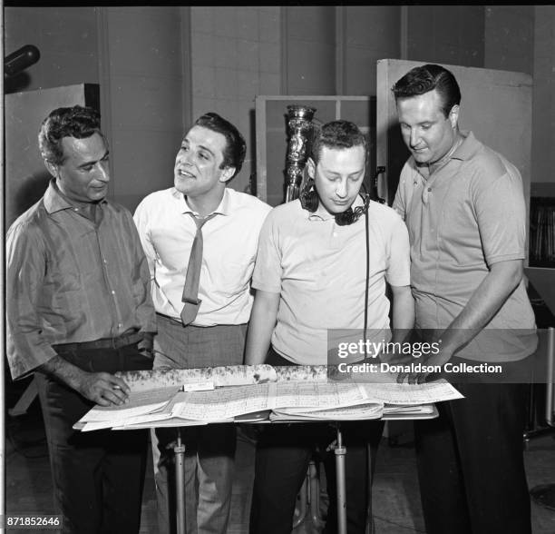 Musicians and producers Al Nevins, Barry Mann, Alan Lorber, and Don Kirshner at a Barry Mann recording session at RCA on September 1, 1961 in New...