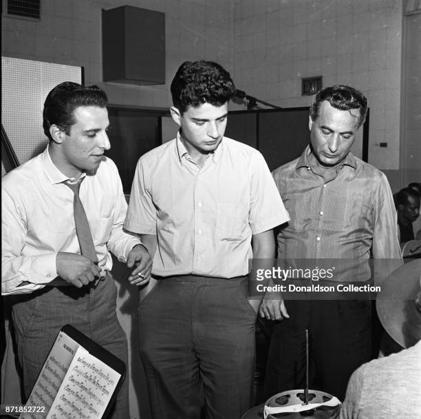 Musicians and producers Barry Mann, Gerry Goffin and Al Nevins at a Barry Mann recording session at RCA on September 1, 1961 in New York.