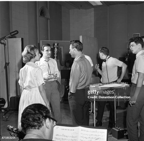 Musicians and producers Carole King, Barry Mann, Al Nevins and Gerry Goffin at a Barry Mann recording session at RCA on September 1, 1961 in New York.