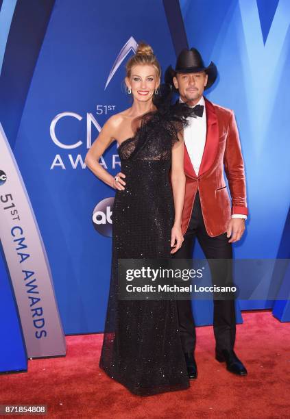 Musical artists Faith Hill and Tim McGraw attend the 51st annual CMA Awards at the Bridgestone Arena on November 8, 2017 in Nashville, Tennessee.