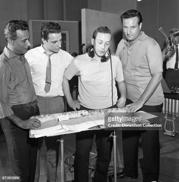 Musicians and producers Al Nevins, Barry Mann, Alan Lorber, and Don Kirshner at a Barry Mann recording session at RCA on September 1, 1961 in New...