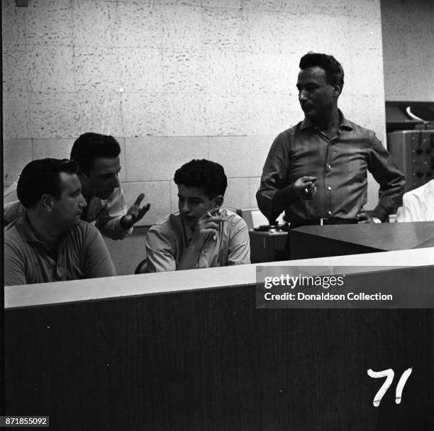 Musicians and producers Don Kirshner, Barry Mann, Gerry Goffin and Al Nevins at a Barry Mann recording session at RCA on September 1, 1961 in New...