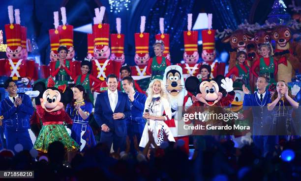 Nick Lachey and Julianne Hough perform during the taping of "The Wonderful World Of Disney: Magical Holiday Celebration" at Walt Disney World on...