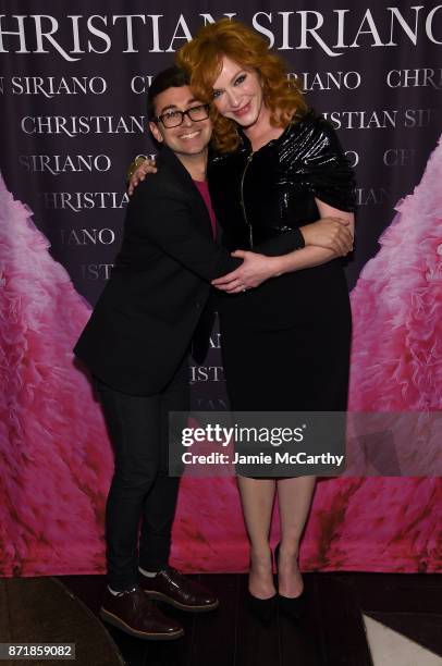 Christian Siriano and Christina Hendricks celebrate the release of his book "Dresses To Dream About" at the Rizzoli Flagship Store on November 8,...