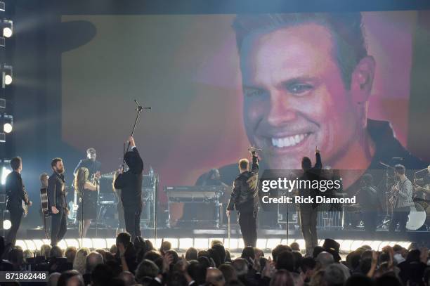 Dierks Bentley, Eddie Montgomery, Gary LeVox, and Jay DeMarcus perform onstage at the 51st annual CMA Awards at the Bridgestone Arena on November 8,...