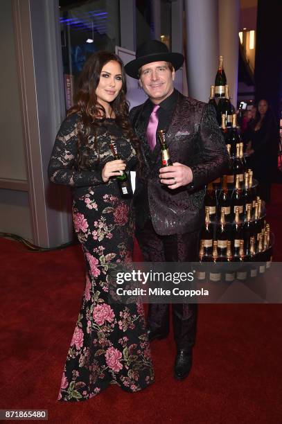 Morgan Petek Niemann and Jerrod Niemann pose with Moet & Chandon during the 51st Annual CMA Awards at Bridgestone Arena on November 8, 2017 in...