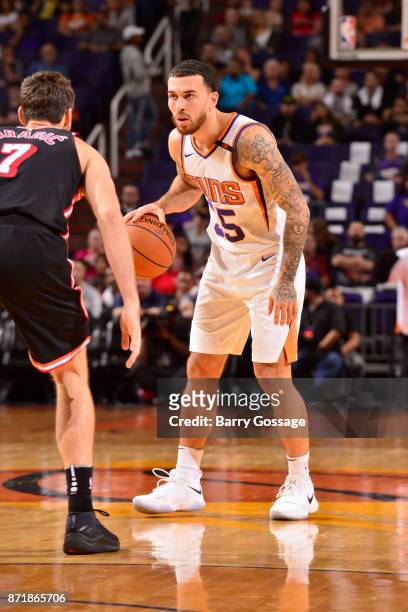Alec Peters of the Phoenix Suns handles the ball during the game against the Miami Heat on November 8, 2017 at Talking Stick Resort Arena in Phoenix,...
