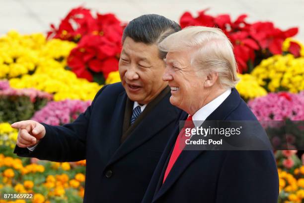 Chinese President Xi Jinping and U.S. President Donald Trump attend a welcoming ceremony November 9, 2017 in Beijing, China. Trump is on a 10-day...