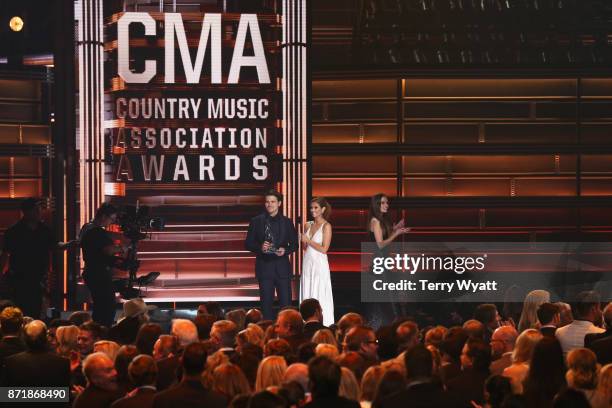 Jason Ritter and JoAnna Garcia Swisher speak onstage during the 51st annual CMA Awards at the Bridgestone Arena on November 8, 2017 in Nashville,...