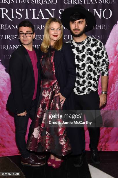 Christian Siriano, Drew Barrymore, and Brad Walsh celebrate the release of his book "Dresses To Dream About" at the Rizzoli Flagship Store on...