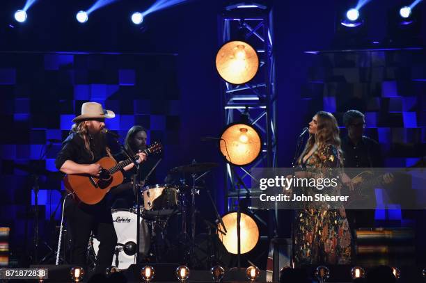 Chris Stapleton and Morgane Stapleton perform onstage at the 51st annual CMA Awards at the Bridgestone Arena on November 8, 2017 in Nashville,...