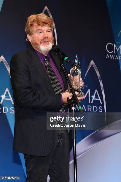 Musician Mac McAnally celebrates winning the Musician of the Year awards during the 51st annual CMA Awards at the Bridgestone Arena on November 8,...