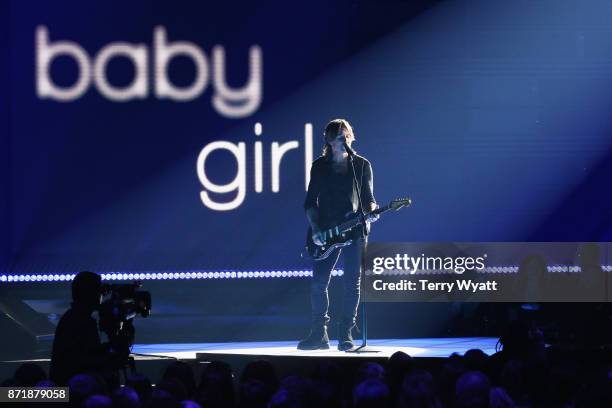 Keith Urban performs onstage during the 51st annual CMA Awards at the Bridgestone Arena on November 8, 2017 in Nashville, Tennessee.