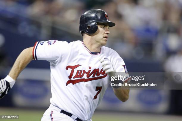 Joe Mauer of the Minnesota Twins bats against the Seattle Mariners on May 9, 2009 at the Metrodome in Minneapolis, Minnesota. The Twins won 9-6.