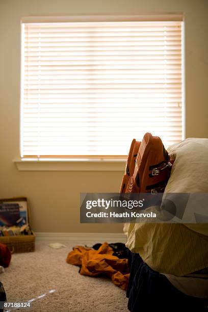 a skier sleeping with his ski boots on. - skidpjäxor bildbanksfoton och bilder