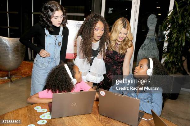 Project Mc2 Mika Abdalla, Victoria Vida, and Genneya Walton participate with girls coding Google's CS First activity during MGA Entertainment, Cast...