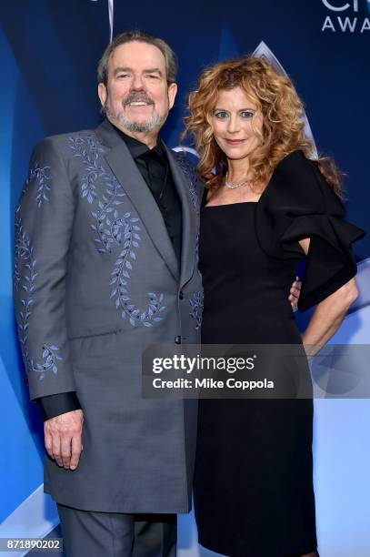 Singer-songwriter Jimmy Webb and Laura Savini pose in the press room the 51st annual CMA Awards at the Bridgestone Arena on November 8, 2017 in...