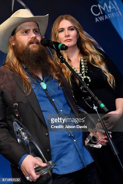 Recording Artst Chris Stapleton and wife Morgane Stapleton speak in the press room after winning Album of the Year award during the 51st annual CMA...