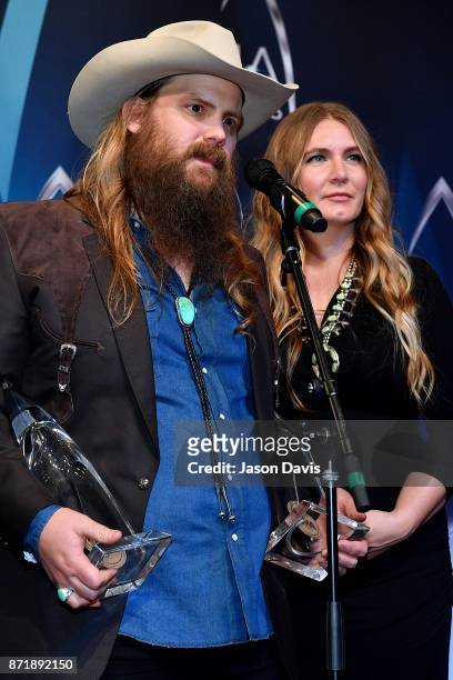 Recording Artst Chris Stapleton and wife Morgane Stapleton speak in the press room after winning Album of the Year award during the 51st annual CMA...