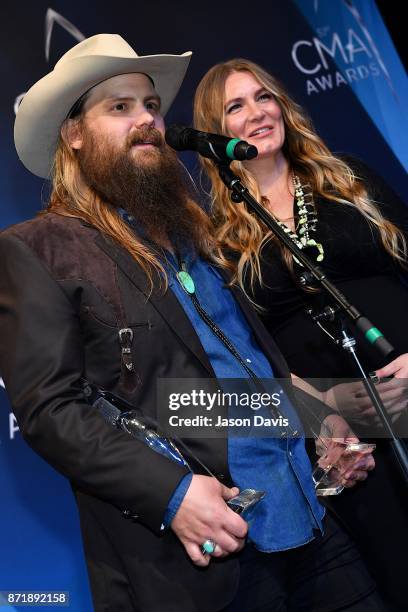 Recording Artst Chris Stapleton and wife Morgane Stapleton speak in the press room after winning Album of the Year award during the 51st annual CMA...