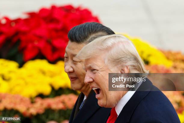 President Donald Trump takes part in a welcoming ceremony with China's President Xi Jinping on November 9, 2017 in Beijing, China. Trump is on a...