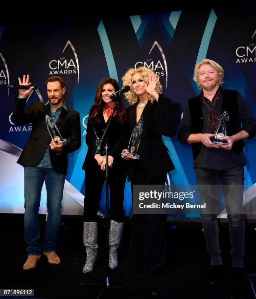 Jimi Westbrook, Karen Fairchild, Kimberly Schlapman and Philip Sweet of Little Big Town speak in the press room during the 51st annual CMA Awards at...