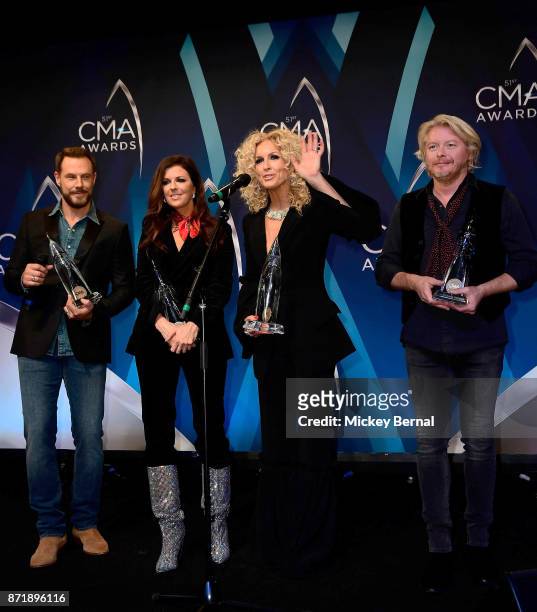 Jimi Westbrook, Karen Fairchild, Kimberly Schlapman and Philip Sweet of Little Big Town speak in the press room during the 51st annual CMA Awards at...