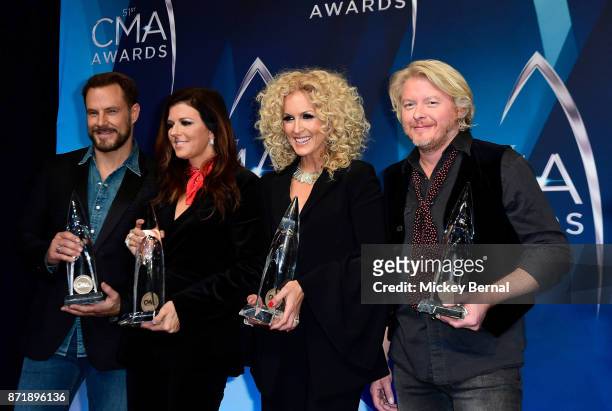 Jimi Westbrook, Karen Fairchild, Kimberly Schlapman and Philip Sweet of Little Big Town pose in the press room during the 51st annual CMA Awards at...