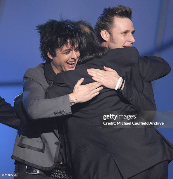 Billie Joe Armstrong and Mike Dirnt of Green Day, winners of the award for Record Of The Year for "Boulevard Of Broken Dreams"