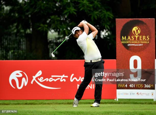 Clyde Mondilla of the Philippines plays a shot during round one of the Resorts World Manila Masters at Manila Southwoods Golf and Country Club on...