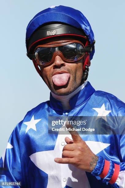 Michael Walker riding All Too Huiying gestures with his tongue out after winning race 7 the Seppelt Wines Stakes on 2017 Oaks Day at Flemington...