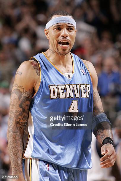 Kenyon Martin of the Denver Nuggets looks on in Game Three of the Western Conference Semifinals during the 2009 NBA Playoffs against the Dallas...