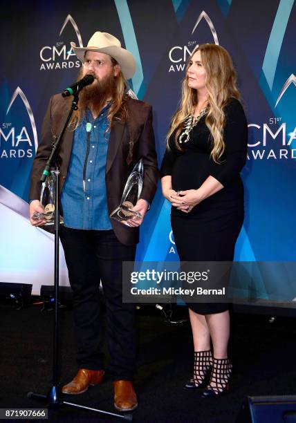 Chris Stapleton and wife Morgane Stapleton speak in the press room during the 51st annual CMA Awards at the Bridgestone Arena on November 8, 2017 in...