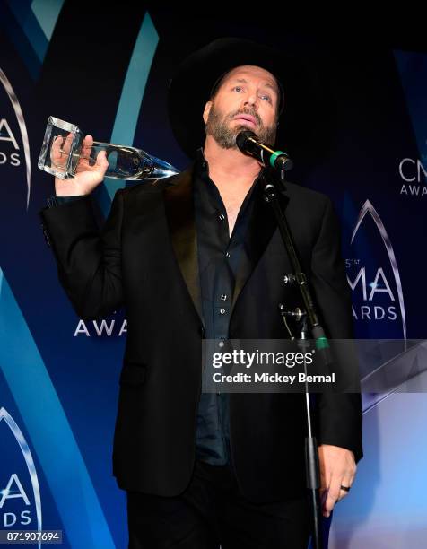 Garth Brooks, winner of the Entertainer Of The Year award, speaks in the press room during the 51st annual CMA Awards at the Bridgestone Arena on...