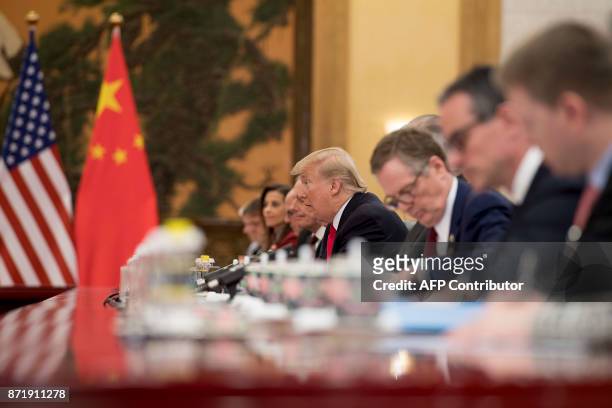 President Donald Trump attends a bilateral meeting with China's President Xi Jinping at the Great Hall of the People in Beijing on November 9, 2017....