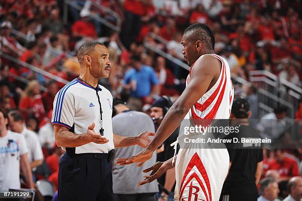 Referee Dan Crawford talks with Ron Artest of the Houston Rockets in Game Four of the Western Conference Semifinals against the Los Angeles Lakers...