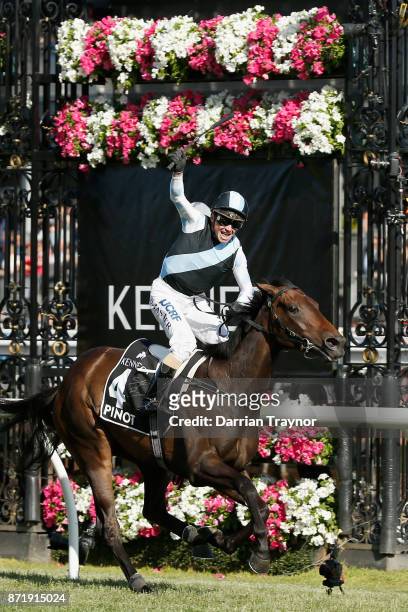 Stephen Baster rides Pinot to win race 8 the Kennedy Oaks on 2017 Oaks Day at Flemington Racecourse on November 9, 2017 in Melbourne, Australia.